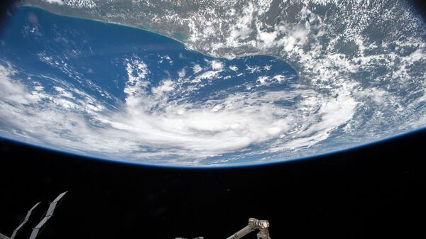 صورة لاعصار فوق خليج المكسيك التقطها رائد فضاء الأمريكي سكوت كيلي من مربكة الفضاء الدولية، 2015 - سبوتنيك عربي