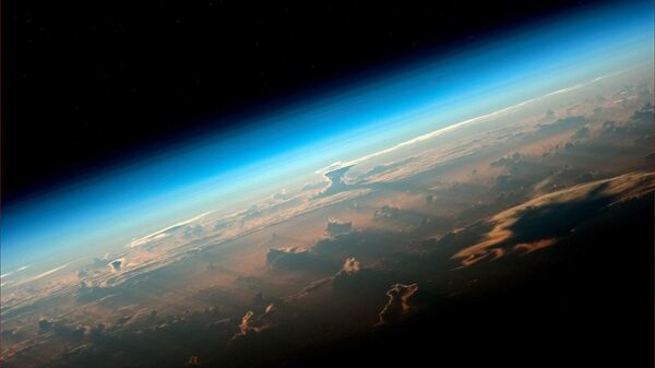 صورة للأرض من محطة الفضاء الدولية التي التقطها رائد الفضاء من وكالة روسكوسموس الروسي أوليغ أرتيمييف - سبوتنيك عربي