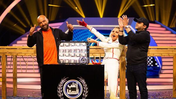 محمد هنيدي ورزان مغربي وأحمد السقا في برنامج المسابقات إغلب السقا - سبوتنيك عربي