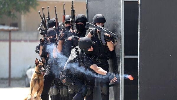 طلاب شرطة حماس الفلسطينية يشاركون في حفل تخرج وسط مخاوف من انتشار COVID-19 في مدينة غزة - سبوتنيك عربي
