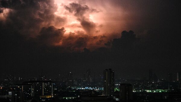 عاصفة رعدية في سماء مانيلا، الفلبين 20 مايو 2020 - سبوتنيك عربي