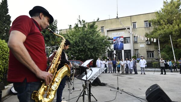 موسيقيون يعزفون داخل مشافي دمشق امتنانا لكوادرها في التصدي لكورونا - سبوتنيك عربي