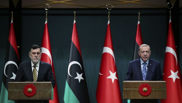 الرئيس التركي رجب طيب أردوغان ورئيس حكومة الوفاق الليبية فايز السراج، 4 يونيو 2020 - سبوتنيك عربي