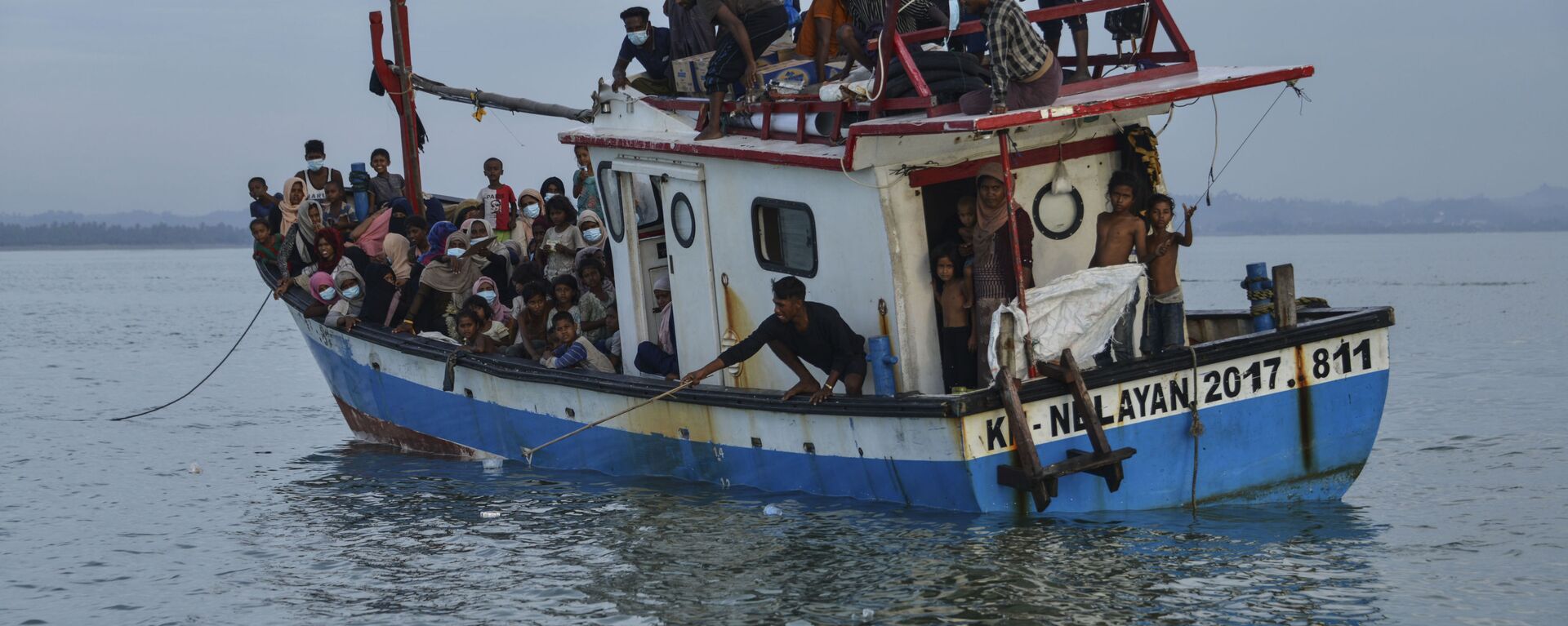 قارب ينقل أشخاص من الروهينغا القادمين من ميانمار، قبالة سواحل إندونيسيا، 25 يونيو 2020 - سبوتنيك عربي, 1920, 30.09.2021