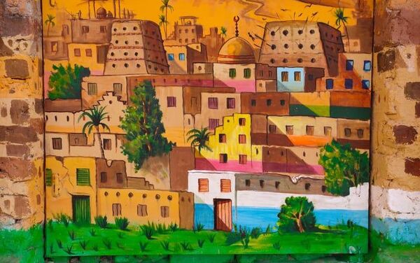 فنان يحول منازل مهجورة بصعيد مصر للوحات فنية في محافظة قنا جنوب مصر - سبوتنيك عربي